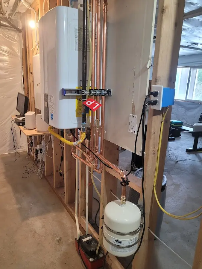 Licensed plumber repairing a kitchen sink in Boonville
